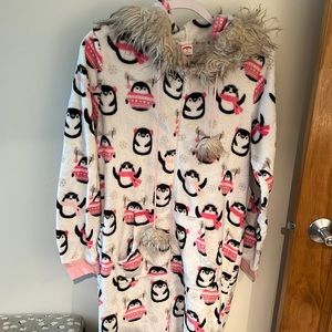 Soft and cozy penguin onesie.